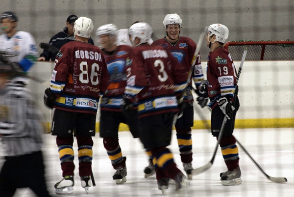 ice dogs celebrate