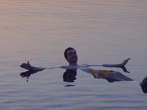 Floating in the Dead Sea (courtesy Jez S at Flickr CC)