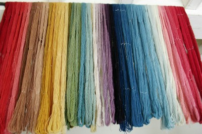 Colored yarns at the weaver's, Colonial Williamsburg, Virginia (Scarborough photo)