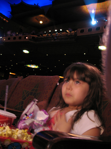 Enthralled movie watcher at Atlanta's Fox Theatre (courtesy hoyasmeg at Flickr CC)