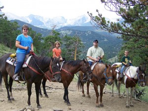 In the Colorado Rocky Mountains, the Page family on horseback (courtesy Sarah Page) In the Colorado Rocky Mountains, the Page family on horseback (courtesy Sarah Page)