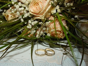 Wedding rings and bouquet